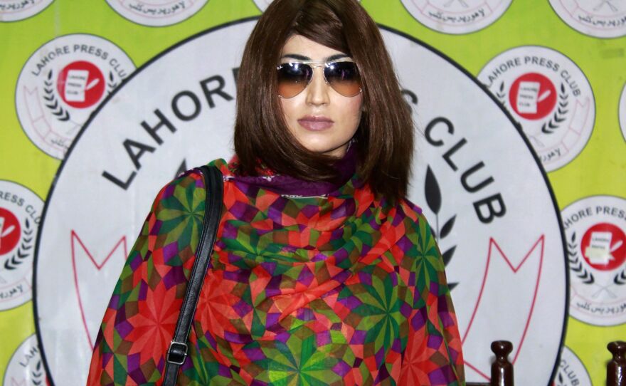 Qandeel Baloch, a Pakistani social media celebrity shown here at a June 28 press conference in Lahore, was murdered by her brother in an honor killing on July 15.