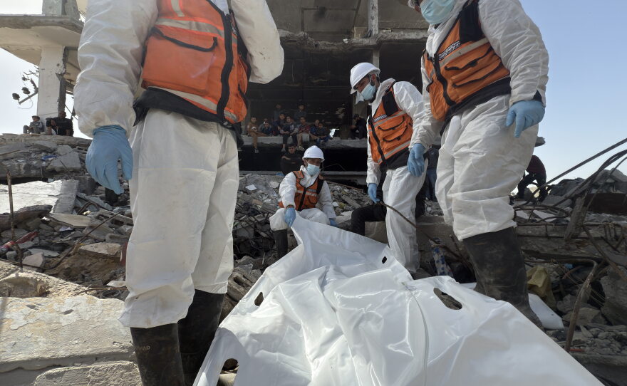 Palestinian rescue workers begin the work of retrieving corpses from under the rubble of homes bombed by Israel during the war in Beit Lahia, Gaza, on Feb. 16, 2026.