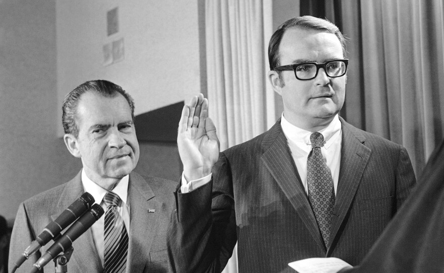 William Ruckelshaus is sworn in as administrator of the new Environmental Protection Agency as President Richard Nixon looks on at the White House on Dec. 4, 1970.