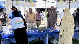 People gather at voter registration tables outside of Islamic Center of San Diego, Sept. 18, 2026.