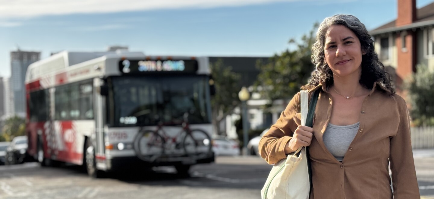 Monica De La Cruz stands in Golden Hill as an MTS bus passes behind her, March 2, 2026.