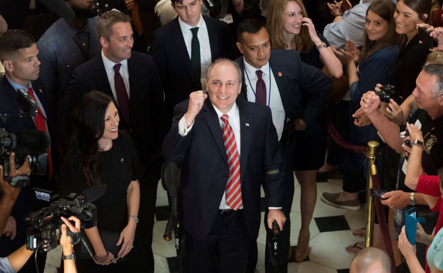 Rep. Steve Scalise, R-La., walks through Statuary Hall at the U.S. Capitol as he returns to work Thursday after being injured in a shooting at the Republican Congressional baseball team practice on June 14.