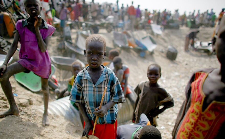 Hundreds of thousands of South Sudanese have fled their homes because of the ongoing civil war. (Above) Kids at a displaced persons camp in Bentiu. Many of the residents came from the part of South Sudan where the shipping container massacre reportedly occurred.