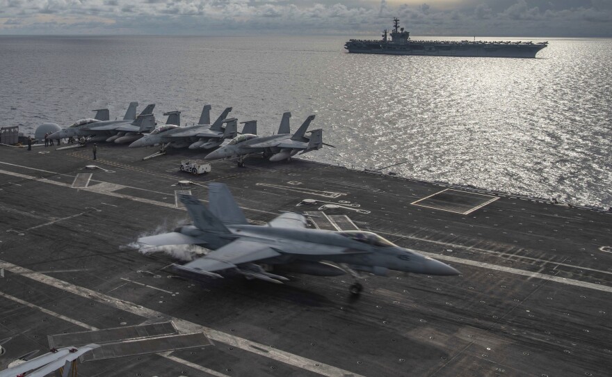 A U.S. F/A-18E Super Hornet lands on the flight deck of the USS Ronald Reagan in the South China Sea in July 2020. U.S. officials now routinely describe China as the leading national security threat as relations have worsened in recent years.