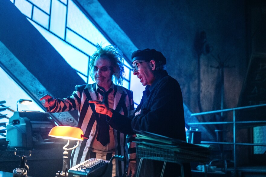 Tim Burton directing Michael Keaton on the set of Beetlejuice Beetlejuice." (2024)