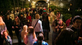 Crowds walk through Balboa Park during December Nights, 2014. 