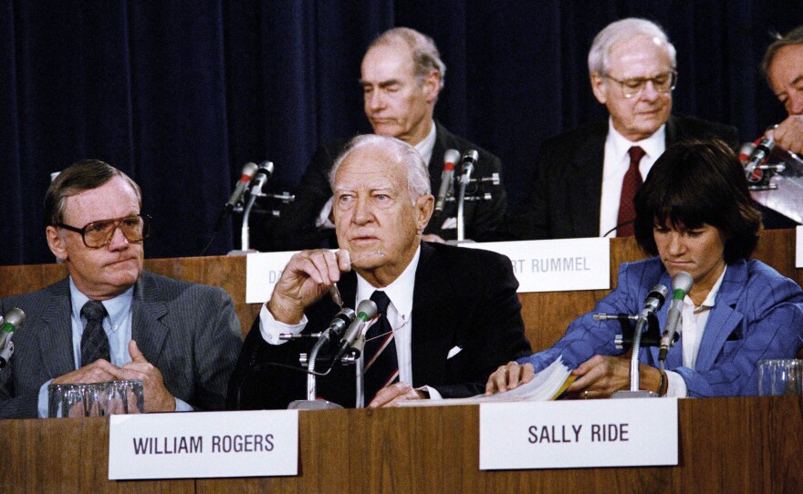 The chairman of the Presidential Commission on the Space Shuttle Challenger Accident, William Rogers (center), and panel members Neil Armstrong (left) and Sally Ride attend one of the hearings concerning the disaster, on Feb. 25, 1986, in Washington, D.C.