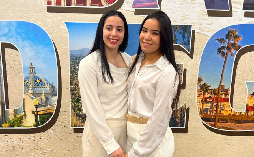 Massiel and Diana smile after their marriage ceremony at the San Diego County Clerks office, Feb. 14, 2024.
