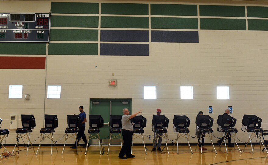 Voters cast their ballots at Shadow Ridge High School last November in Las Vegas.