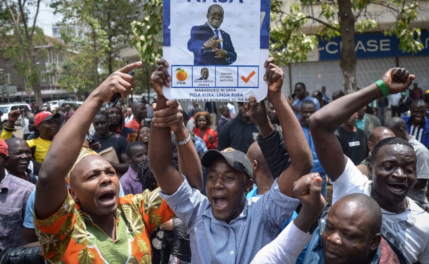 Supporters of opposition challenger Raila Odinga celebrate Friday after Kenya's Supreme Court ordered a rerun of the Aug. 8 presidential vote.