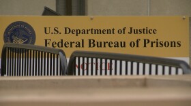 A Federal Bureau of Prisons sign outside of the Metropolitan Correction Center in downtown San Diego, Jan. 17, 2019.
