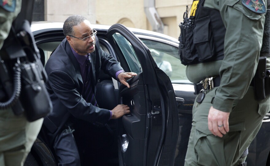 Officer Caesar Goodson, one of six Baltimore city police officers charged in connection with the death of Freddie Gray, arrives at the courthouse in Baltimore ahead of Thursday's verdict.