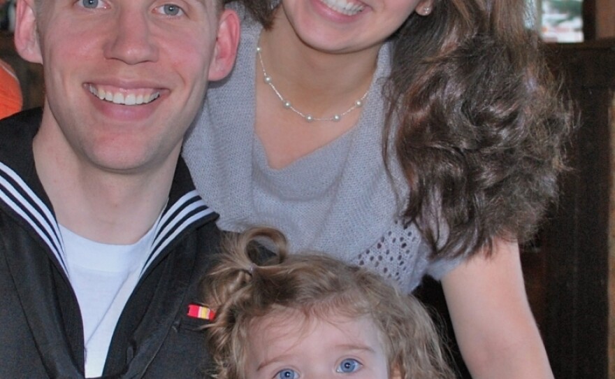 Justin Bock with his wife, Ashley, and their daughter, Lina.