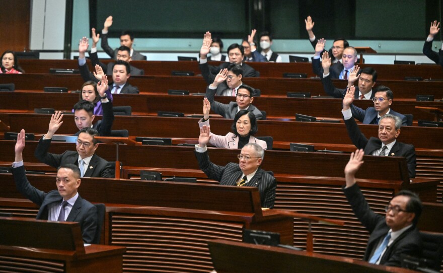 Lawmakers vote for Article 23 legislation in Hong Kong on Tuesday.