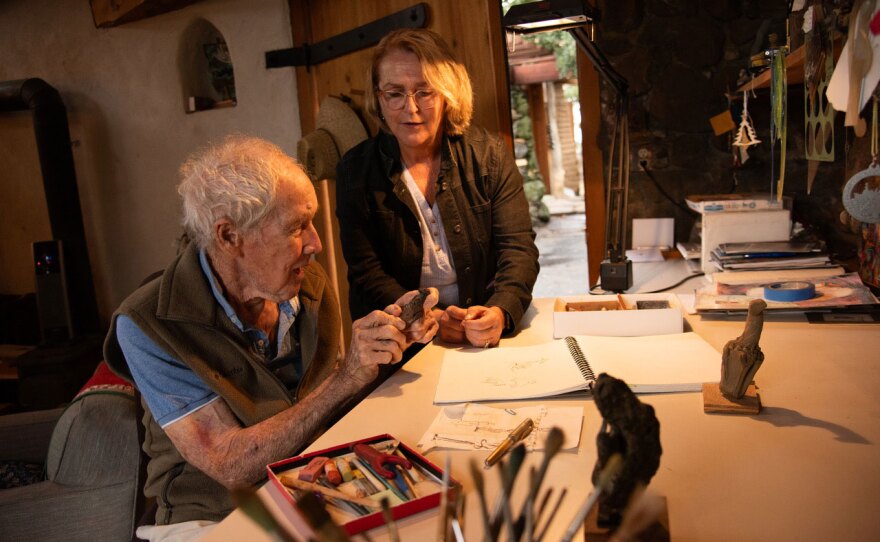 Artist James Hubbell and filmmaker Marianne Gerdes, executive director of Ilan-Lael Foundation, are shown working in an undated photo.