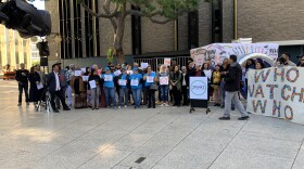 Members of community groups opposed to use of Flock cameras in San Diego, gather at Civic Center Plaza for a news conference on December 4, 2025.