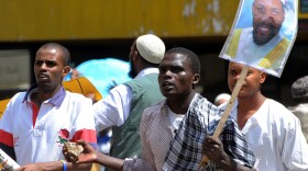 Kenyan Muslims in Nairobi carry posters of Jamaican cleric Abdullah Faisal and throw stones at police during a Jan. 15 demonstration demanding Faisal's release from Kenyan custody. U.S. intelligence officials say Faisal was recruiting for al-Shabab, a Somali Islamic militia with links to al-Qaida. Faisal denies the allegations. He was eventually returned to Jamaica from Kenya.