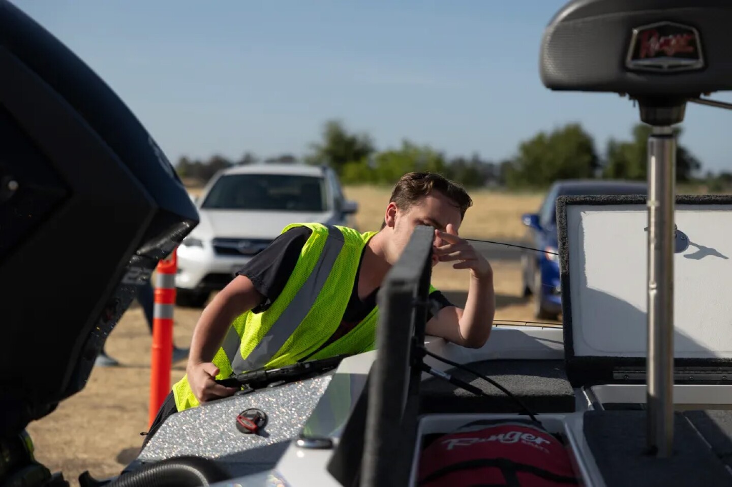 Inspection teams examine boats at the Thermalito Forebay.