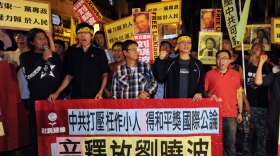 Protesters demonstrate in support of freeing Liu Xiaobo, who won the 2010 Nobel Peace Prize, in Hong Kong on Friday.