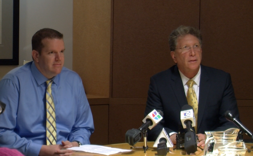 Drew Belnap, left, and his lawyer, Irwin Zalkin, answer reporters' questions at press conference Wednesday, June 12.