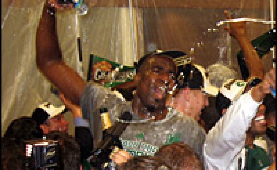 Kendrick Perkins, the Celtics' starting center, celebrates after the win.