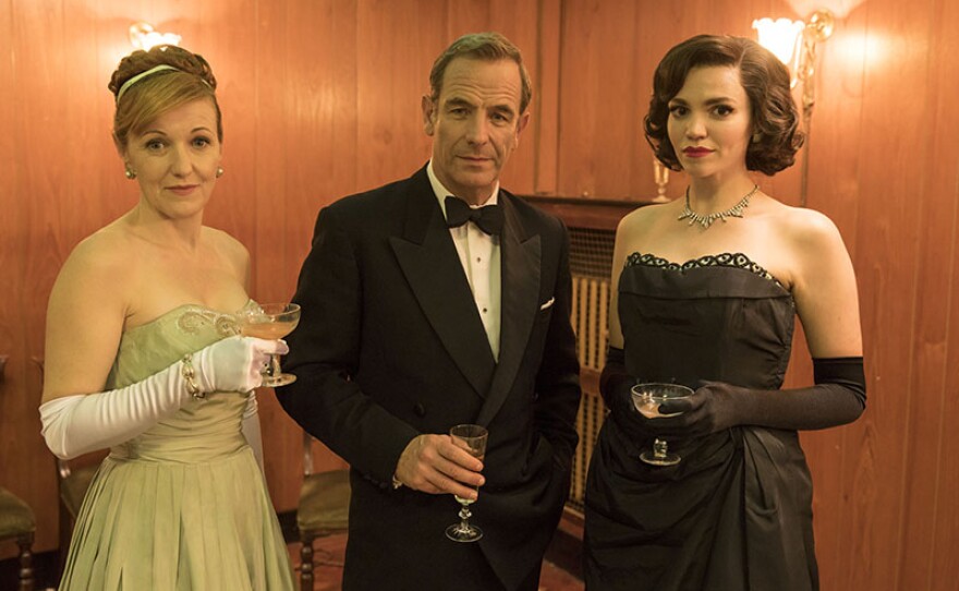 Pictured from left to right: KACEY AINSWORTH as Cathy Keating, ROBSON GREEN as Geordie Keating, and SELINE HIZLI as Margaret.