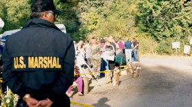 U.S. Marshal at roadblock down the mountain from the Weaver cabin. Northern Idaho (undated photo)