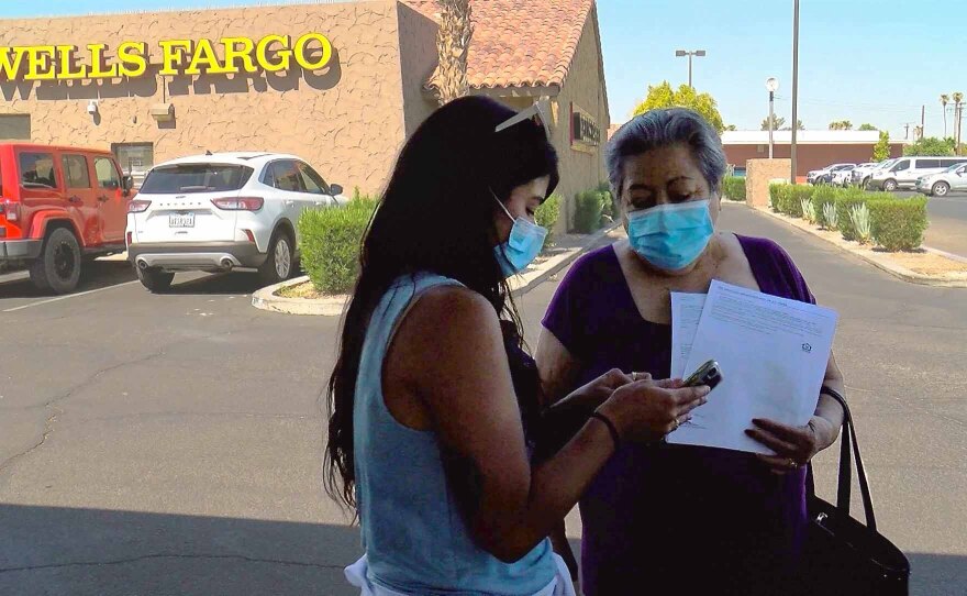 Maria Lopez speaks with KPBS reporter Cristina Kim in this undated photo. El Centro, Calif. Aug. 3, 2021.