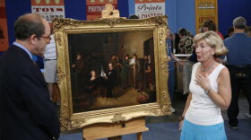 At "Antiques Roadshow" in Dallas, Texas, the owner is left speechless after discovering her piece of artwork, purchased by her great-great-great-grandfather, is an 1847 oil painting by noted 19th-century artist James Henry Beard. Titled "The Illustrious Guest," the painting cleverly depicts famous American statesman Henry Clay as a guest at a tavern. Delighted appraiser Alan Fausel of Bonhams gives the painting an estimable auction value of $300,000 to $500,000.