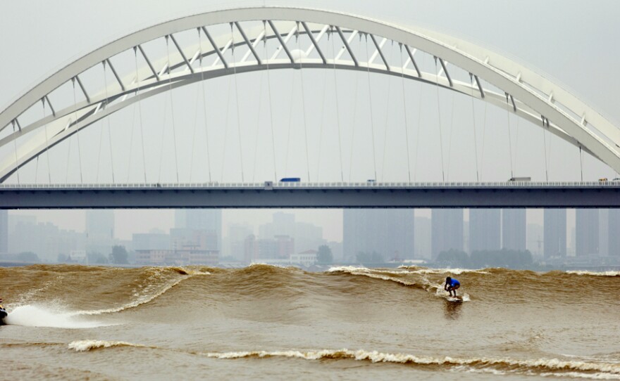 During a surfing competition this week on a river in Hangzhou, China, surfers rode 10-foot waves. The unusual wave draws international competitors every fall.