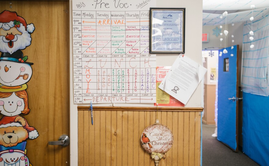 A calendar detailing the weekly schedule for adults with intellectual disabilities hangs in a room at the Arc Northeastern Pennsylvania.