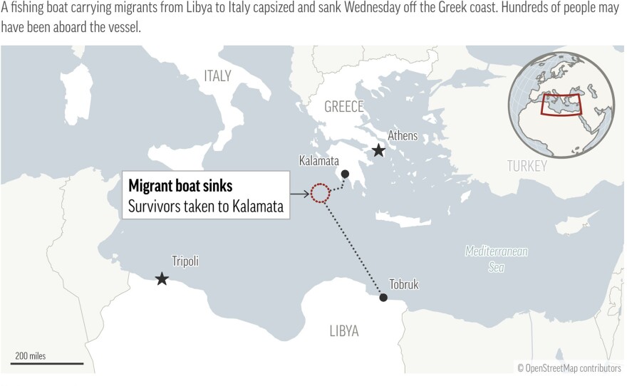 A map shows the route that a fishing boat carrying migrants to Italy from Libya sank in the Mediterranean Wednesday.