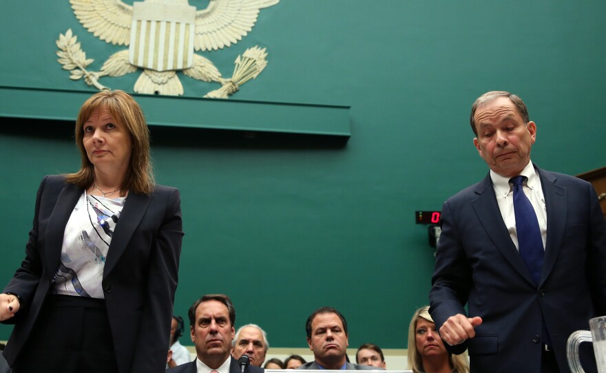 GM CEO Mary Barra and Anton Valukas, head of GM's internal recall investigation, stand at the witness table during a House Energy and Commerce Committee hearing on Capitol Hill Wednesday.