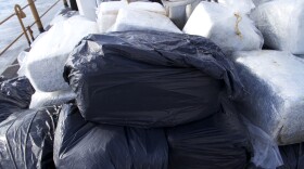 Several bales of marijuana sit on the deck of a U.S. Coast Guard cutter after they were recovered from the water approximately 30 nautical miles west of Mission Beach, Wednesday, Oct. 10, 2012. 