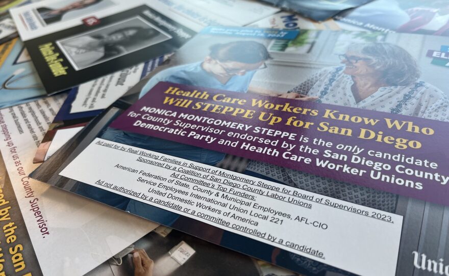 Flyers supporting and opposing candidates in the special election for the County Board of Supervisors are shown on Jul. 27, 2023.