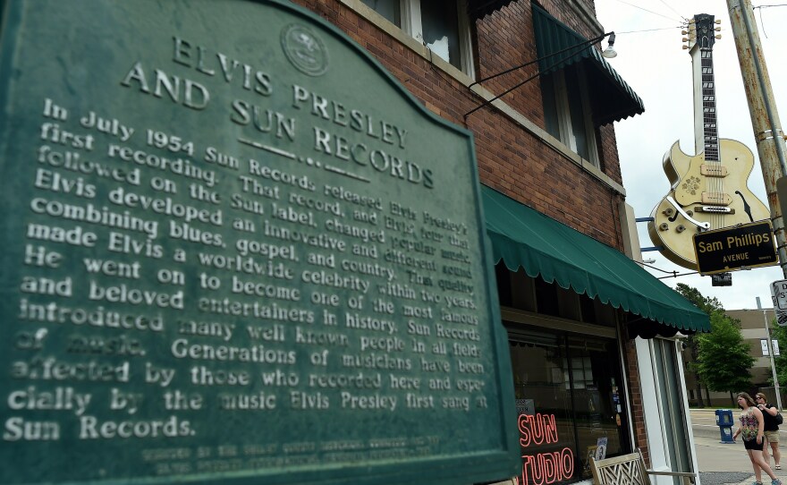A sign details Elvis Presley's history with Sun Studio outside the site in Memphis, Tenn.
