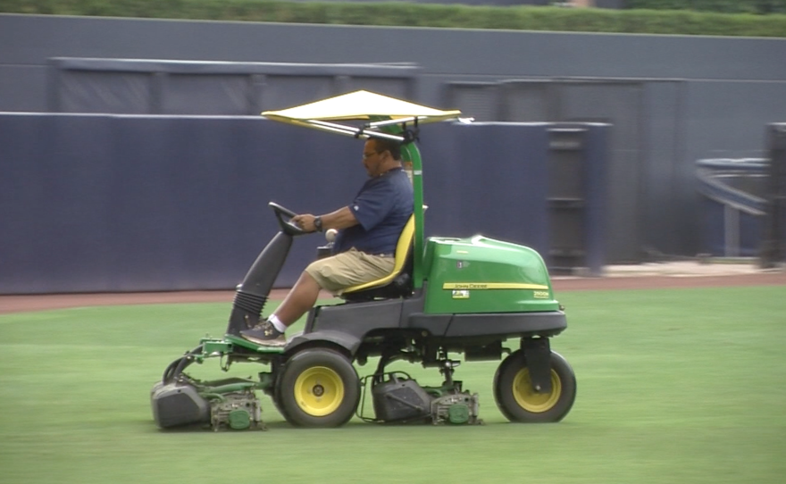 One of the San Diego Padres biodiesel-powered lawnmowers makes its rounds in center field at Petco Park, Aug. 8, 2015.