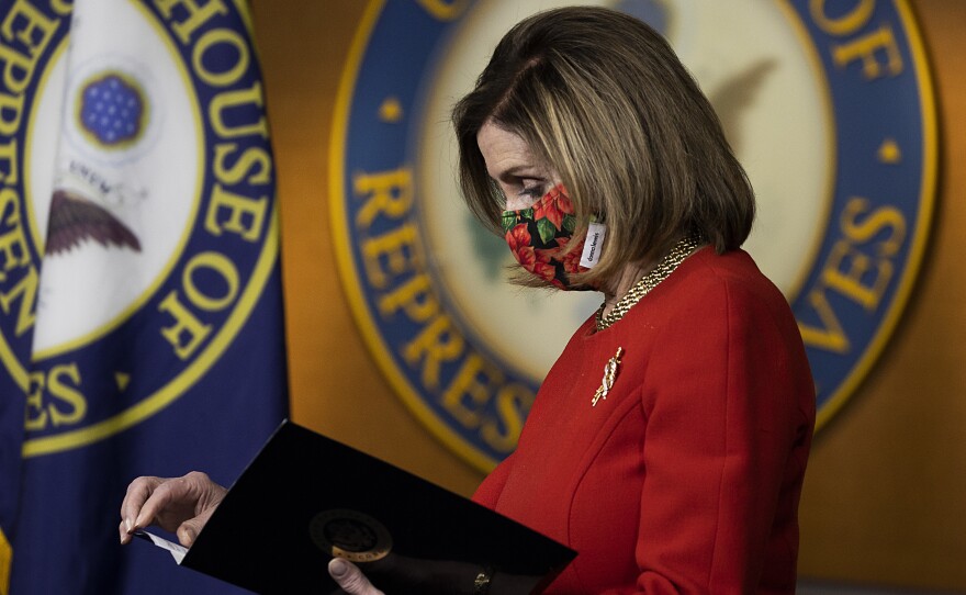 Speaker of the House Nancy Pelosi, D-Calif., holds a press conference on Sunday. Congress is scrambling after President Trump blasted a major aid and spending package that lawmakers passed Monday.