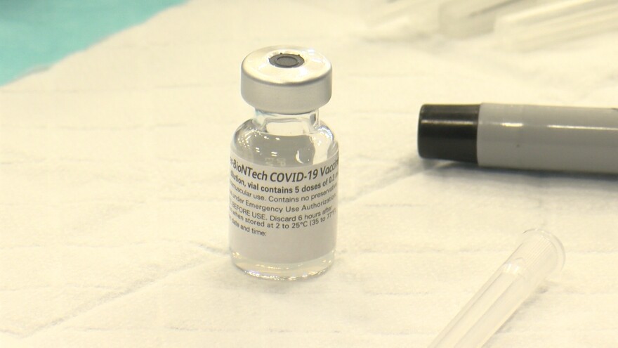 A vial of a COVID-19 vaccine at the CSU San Marcos vaccination site. Feb. 22, 2021.