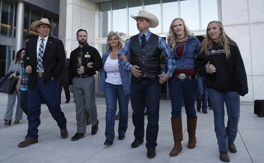 Ammon Bundy (from left), Ryan Payne and Ryan Bundy on the day a mistrial was declared last month. They were joined by Jeanette Finicum, widow of Robert "LaVoy" Finicum, and Ryan's wife and daughter.