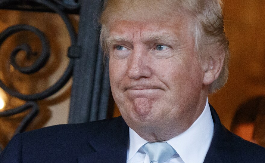 President-elect Donald Trump talks to reporters at Mar-a-Lago in Palm Beach, Fla., last month. He met Friday with top U.S. intelligence officials about Russian interference in the election.