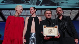 Left to right: Tilda Swinton poses with Renate Reinsve, Cristian Mungiu — winner of the Palme d'Or for Fjord — and Sebastian Stan, during the awards ceremony at the 79th Cannes international film festival, in southern France, on Saturday.