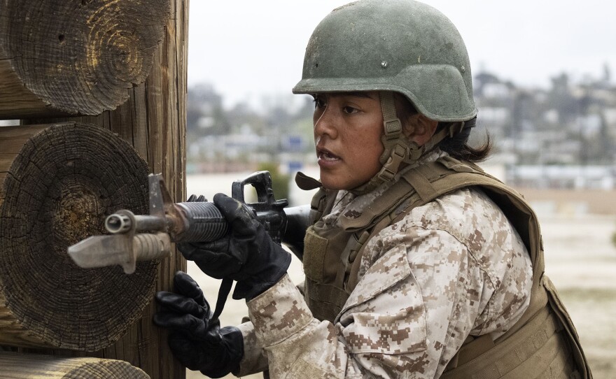 A Marine recruit from Lima Company on the Bayonet Assault Course at Marine Corps Recruit Depot, San Diego, March 23, 2021.