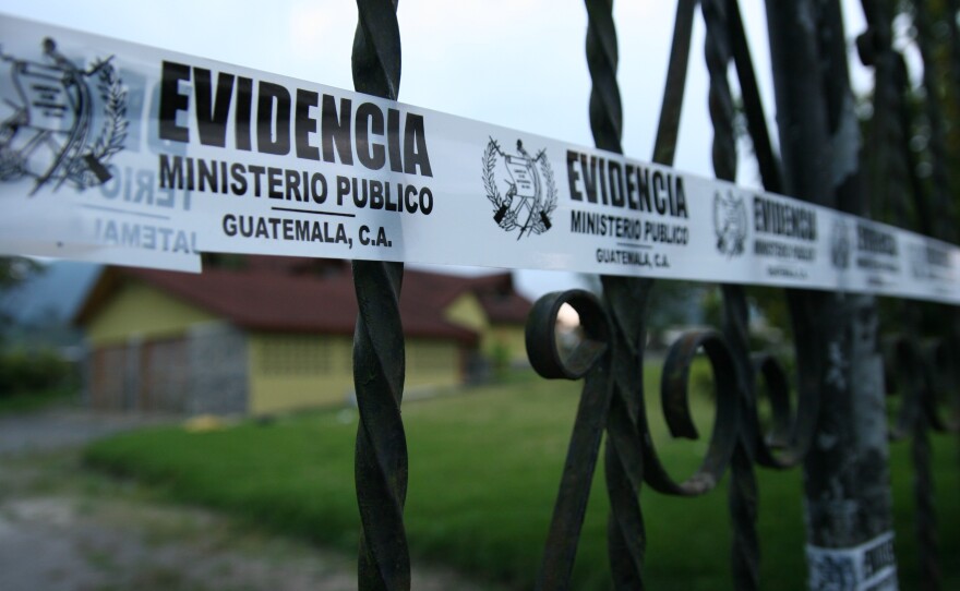 A banner left by Guatemalan prosecutors at a seized ranch owned by a now convicted politically connected drug trafficker reads "Evidence" in this undated photo. 