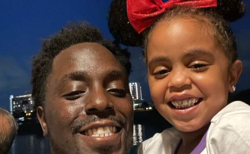 Elgin Oliver with his daughter.