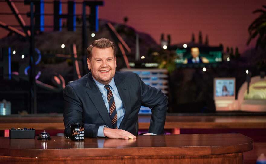 James Corden behind the desk at <em>The Late Late Show.</em>