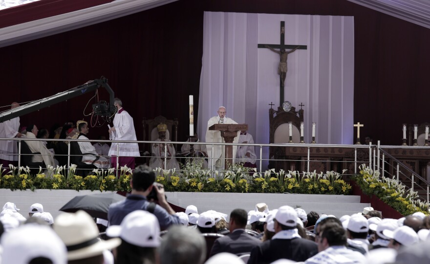 Pope Francis celebrates Mass at the Air Defense Stadium in Cairo.(AP Photo/Nariman El-Mofty)