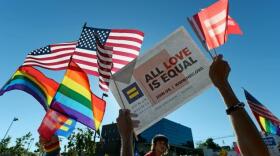 Same-sex marriage supporters celebrate the US Supreme Court ruling during a community rally on June 26, 2013 in West Hollywood, California.
