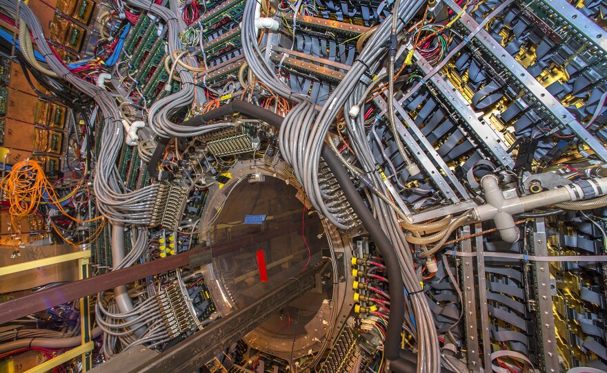 The STAR detector used in the antimatter experiment is the size of a house. It's able to track particles created when atoms collide at its center.