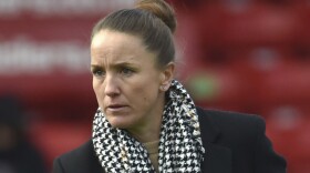 Manchester United manager Casey Stoney gestures during the English Women's Super League soccer match between Aston Villa and Manchester United at the Bank's Stadium in Walsall, England, in this Saturday, Dec. 5, 2020, file photo. 